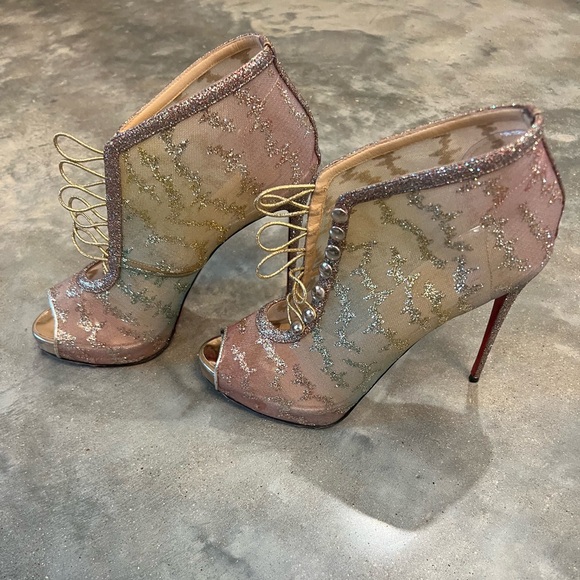 Authentic Christian Louboutins iridescent buckle up heels